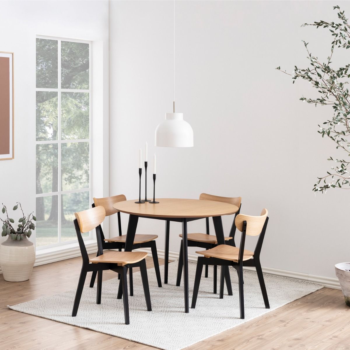 Roxby Round Dining Table in Oak & Black includes 4 Roxby Dining Chairs in Black and Oak